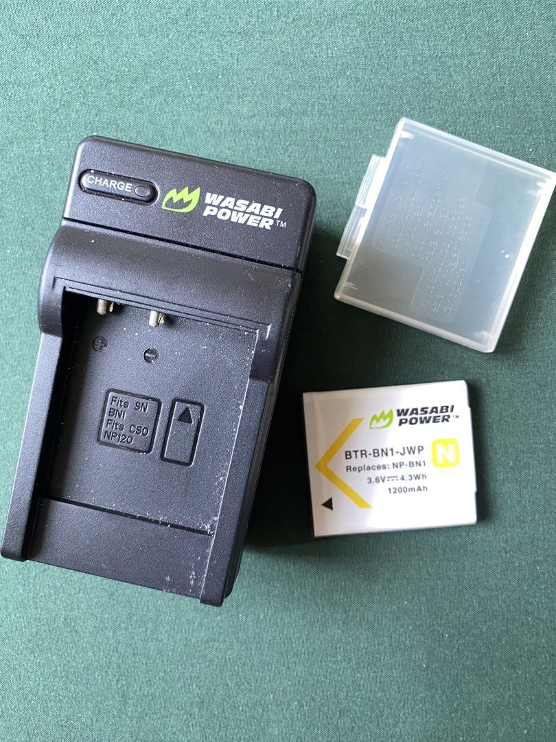 Wasabi Power Camera Battery Charger and Battery (Category: Batteries & Chargers) located in Paranaque City. Submitted by daaaunnn (Listing ID 1434033767, Image 1). Description: - Wasabi Power Camera Battery Charger and BTR-BN1-JWP Battery - Charger Compatibility: SN, BNI, CSO, NP120 batteries - Battery Specs: - 3.6V - 4.3Wh - 1200mAh - Replaces NP-BN1 batteries - Includes Battery Case RFS: decluttering.