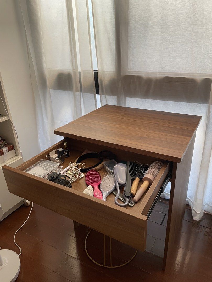 Wooden Vanity Table with Drawer an Hanging Shelf (Category: Tables & Sets) located in Pasay City. Submitted by giggiii (Listing ID 1434062606, Image 2). Description: Selling this custom-built wooden desk with drawer and hanging shelf. Perfect for small spaces, work-from-home setup, or vanity use. *Stool not included* • Custom-made piece • Used for about 2.5 years • Good condition • Smooth and spacious drawer with soft close mechanism • Clean wood