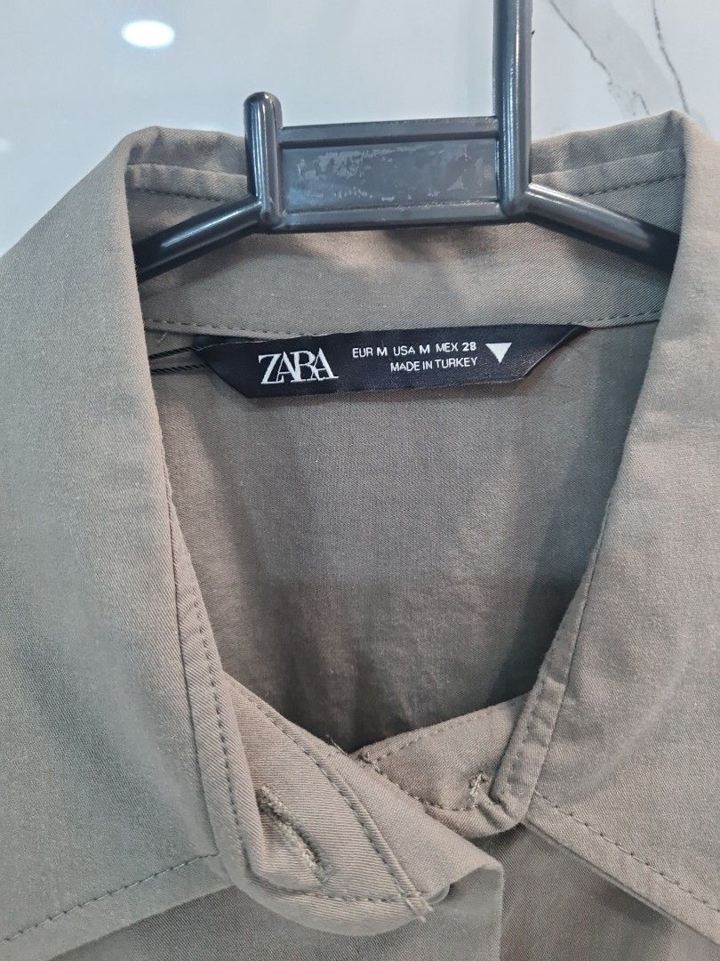 Zara Polo - Olive Green - Size M (Category: Shirts) located in San Juan City. Submitted by rwongthings (Listing ID 1434008429, Image 3). Description: - Zara Olive Green Button down - Size M - Collared neckline - Long sleeves with buttoned cuffs - Two front pockets - Store bought - Made in Turkey - Original price: PHP 1995 - Selling for: PHP 1600.