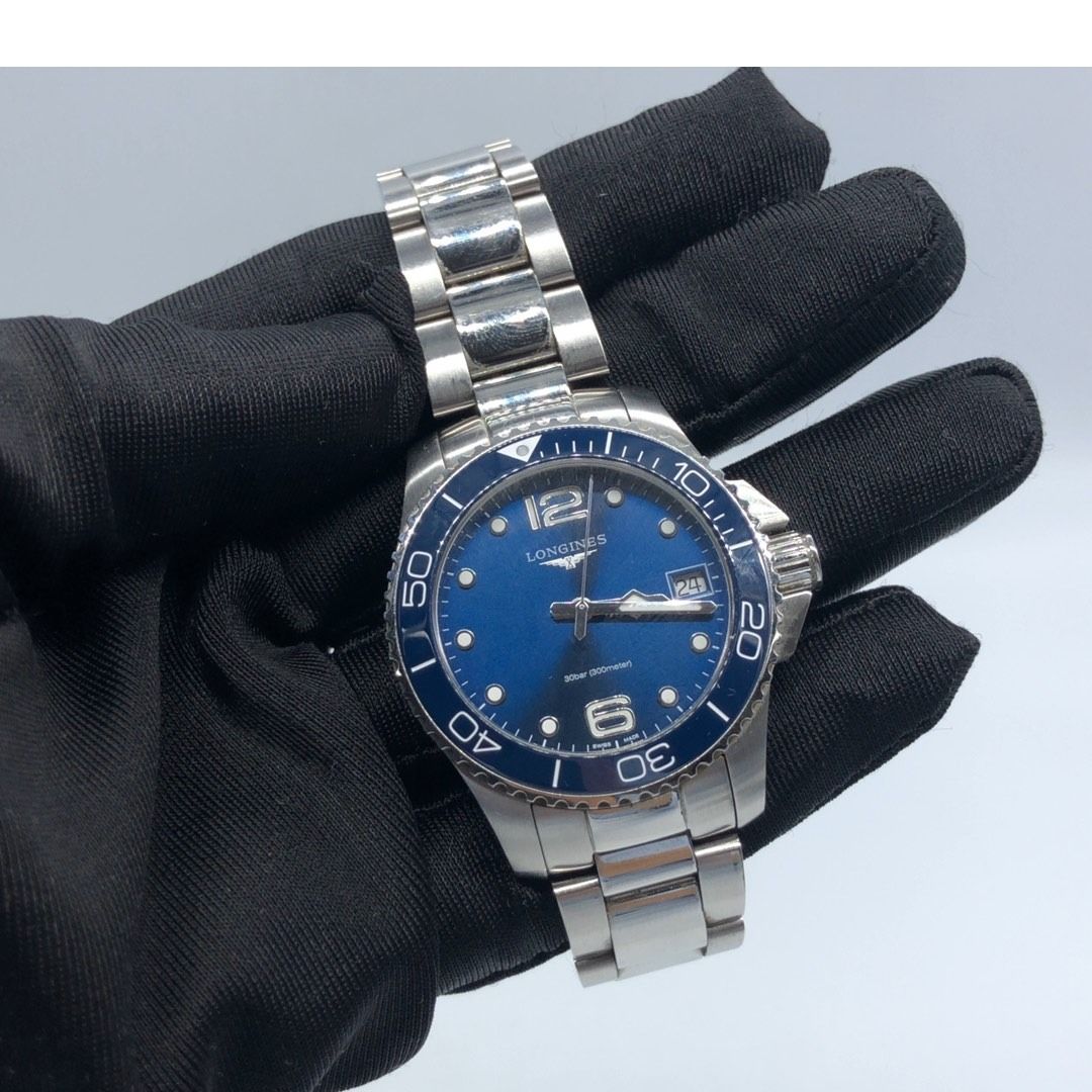 267003473 LONGINES WATCH CONQUEST HYDROCONQUEST L3.370.4.96.6 COMPLETE (Category: Luxury Watches) located in Taguig. Submitted by ecoring.ph (Listing ID 1434208009, Image 1). Description: ◆CONDITION: B ◆DESCRIPTIONS: (Other defects/info:) The bezel, case back, end piece, crown, links, and clasp of the watch have minimal scratches and show signs of use. The links of the watch are slightly bent. MOVEMENT: * QUARTZ MECHANISM: * WORKING ◆WRIST SIZE: 