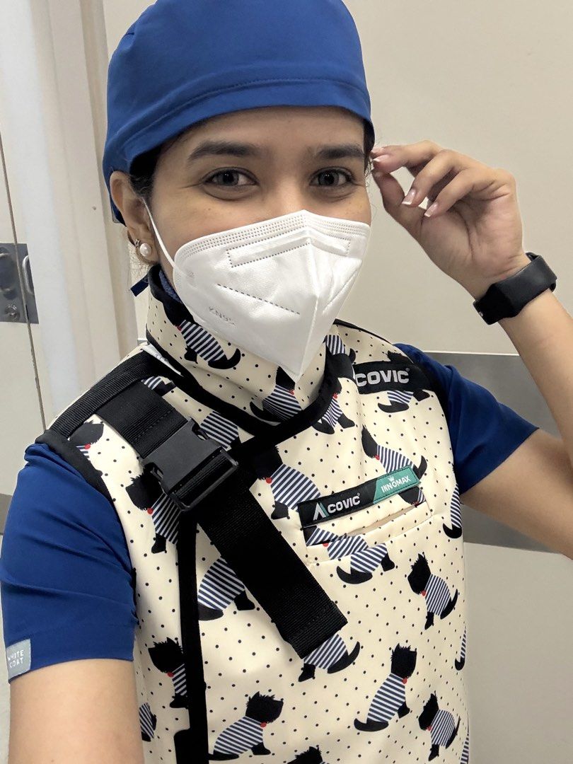 ACOVIC Leadgown (Category: Vests) located in Manila. Submitted by drewgreig95 (Listing ID 1434328184, Image 2). Description: - COVIC protective vest - Unique dog pattern - Adjustable straps for a custom fit - Secure buckle closure - Designed for medical or industrial use - Durable material - Includes neck protector - Features the COVIC logo.