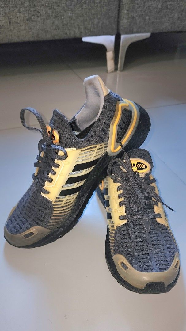 Adidas Climacool Sneakers (Category: Sneakers) located in Imus. Submitted by sashafame (Listing ID 1434291847, Image 3). Description: - Adidas Climacool sneakers - Color: Grey and yellow - Adidas stripes detail - Black soles with orange accents - Climacool logo on the tongue.