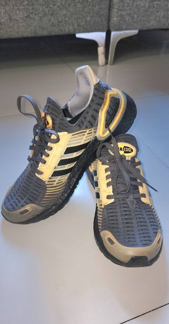 Adidas Climacool Sneakers (Category: Sneakers) located in Imus. Submitted by sashafame (Listing ID 1434291847, Image 2). Description: - Adidas Climacool sneakers - Color: Grey and yellow - Adidas stripes detail - Black soles with orange accents - Climacool logo on the tongue.