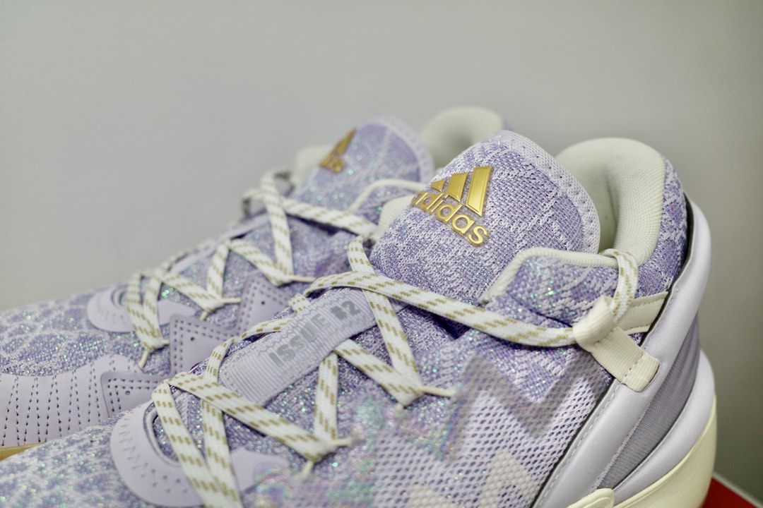 Adidas D.O.N. Issue #2 – ‘Christmas Pack’ (Category: Sneakers) located in San Juan City. Submitted by mindy_derek (Listing ID 1434237533, Image 3). Description: Description: • Adidas D.O.N. Issue #2 (Donovan Mitchell Signature Shoe) • Colorway: Stunning Lavender/Purple with Gold accents and gum soles. • Size: US Men 10.5 • Condition: Only worn a couple of times on Christmas occassions. Never worn in-game. Traction is still perfect! • Vibe: These 