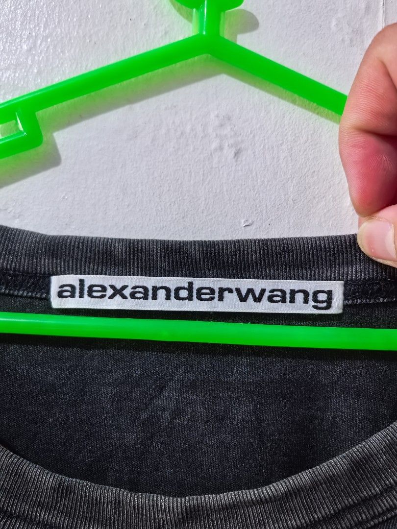 Alexanderwang Acid Wash Oversized Tshirt (Category: Tshirts & Polo Shirts ) located in Lipa City. Submitted by donatzzz (Listing ID 1434177189, Image 3). Description: Alexanderwang Acid Wash Oversized Tshirt Size Tag: L Dimes: 25x30 Condition: Verygood / Need wash Color Rate : 10/10 Gcash or Bank Payment (BPI) Add 75 for shipping fee (J&T).