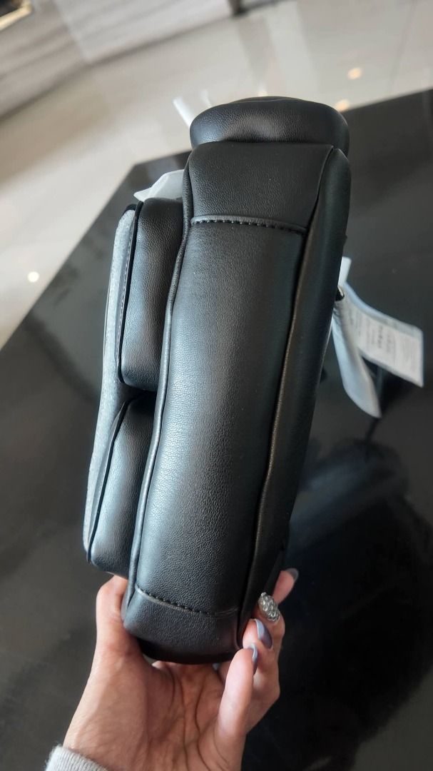 Armani AX Crossbody Bag (Category: Luxury Bags & Wallets) located in Taguig. Submitted by jess.jm (Listing ID 1434350053, Image 2). Description: Originally 12k. Negotiable and Open to offers. - Armani Exchange shoulder or kili bag - Color: Black - Main compartment and two front & side pockets - Adjustable strap - Lined interior with Armani Exchange logo - Includes dust bag and tags - Perfect for everyday or special events.