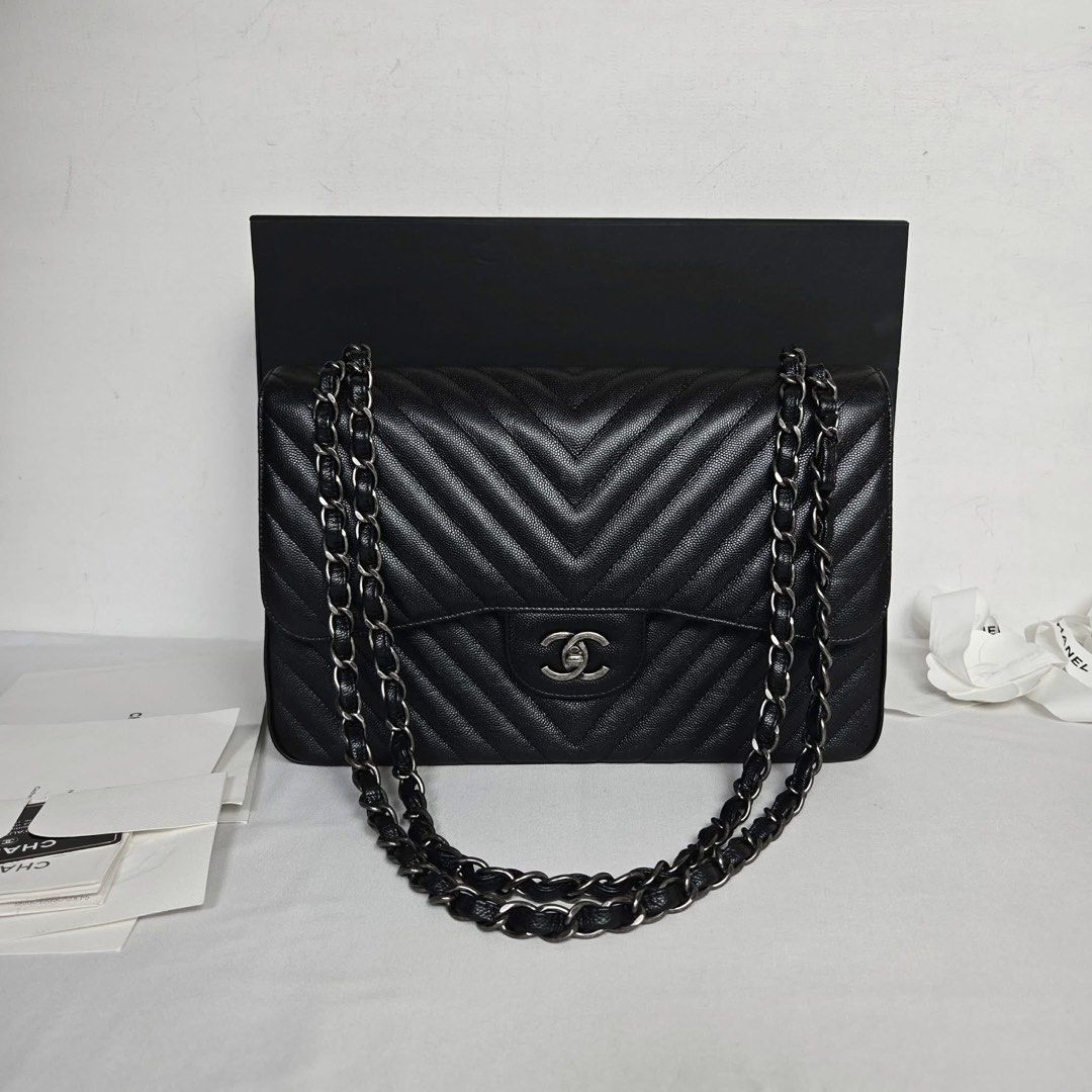 Authentic Chanel Classic Large Caviar (Category: Luxury Bags & Wallets) located in Quezon City. Submitted by jhaediah (Listing ID 1431566256, Image 1). Description: classic large caviar ♥️4.25 metalic black card recipt classic paper booklet box Excellent Free pabitbit Korea- fully paid before paship sa pinas .