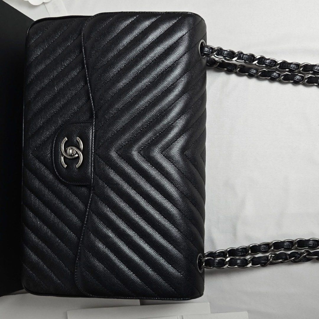 Authentic Chanel Classic Large Caviar (Category: Luxury Bags & Wallets) located in Quezon City. Submitted by jhaediah (Listing ID 1431566256, Image 3). Description: classic large caviar ♥️4.25 metalic black card recipt classic paper booklet box Excellent Free pabitbit Korea- fully paid before paship sa pinas .