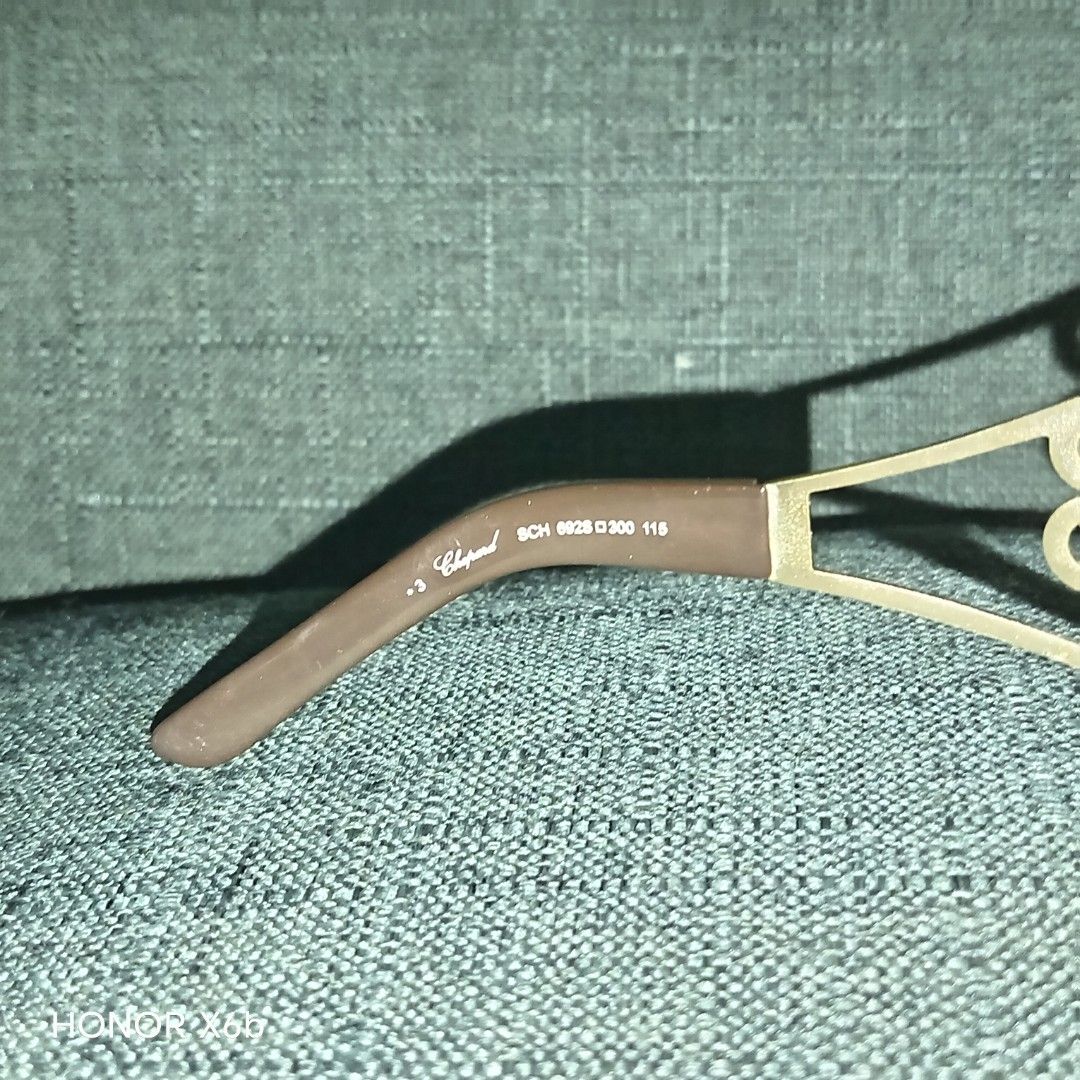 Authentic Chopard SCH 692S Made in Italy w/ Original Case (Category: Sunglasses & Eyewear) located in Santa Maria. Submitted by ann01082015 (Listing ID 1434243957, Image 3). Description: Jackpot! May original Authentic Chopard SCH 692S Made in Italy w/ Original Case *Description:* Selling my 100% authentic Chopard SCH 692S luxury sunglasses with original case *Model Details:* - *Model:* SCH 692S □ 300 115 - *Color:* Shiny Black frame, Brown gradi