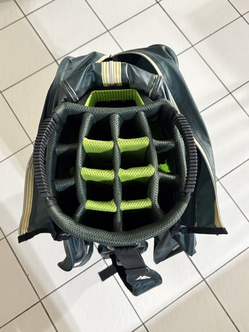 Big Max Aqua 3.0 Waterproof Golf Bag (Category: Golf) located in San Juan City. Submitted by heyitsangel (Listing ID 1434179843, Image 2). Description: - Big Max Aqua 3.0 golf bag - Color: Green and Dark Grey - Waterproof construction - Multiple compartments and pockets - Dedicated glove holder - Includes top cover - Comfortable carrying strap - Features the Big Max logo.