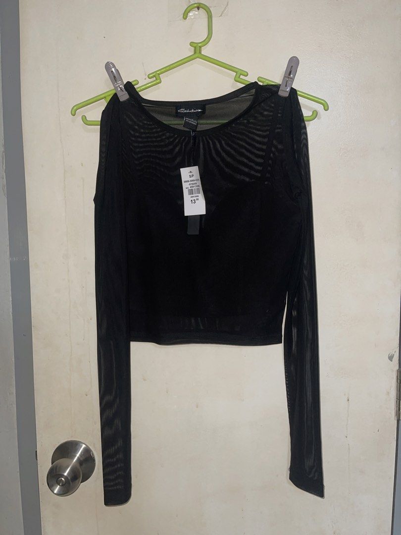 Black crop top long sleeves see through (Category: Longsleeves) located in Pasig City. Submitted by tjrys (Listing ID 1434327007, Image 1). Description: Never worn Bought from Canada Size Small Crop top Long sleeves See-through.