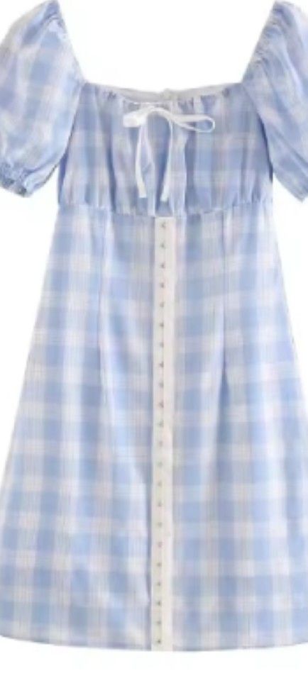 Blue Plaid Puff Sleeve Dress (Category: Dresses) located in Manila. Submitted by anez06 (Listing ID 1434304492, Image 2). Description: - Blue plaid mini dress - Features puff sleeves - Square neckline with white lace detail - Made of lightweight fabric - Fitted bodice - Slightly flared skirt - Ideal for warm weather.