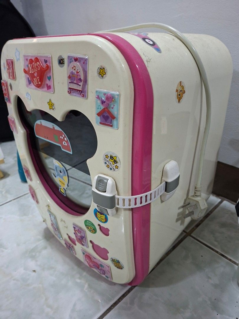 Bottle Sterilizer (Category: Breastfeeding & Bottle Feeding) located in Manila. Submitted by numismaticguy (Listing ID 1434227305, Image 2). Description: - Pink and white design - Mickey Mouse window - Includes bottle rack - Locking top - Ideal for sterilizing baby bottles and feeding accessories.