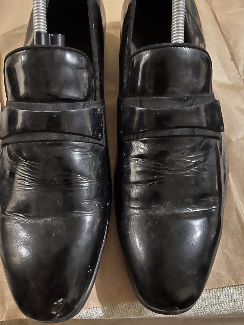 Calvin Klein Black Leather Loafers - Size 43 (Category: Dress Shoes) located in Las Pinas. Submitted by boogieman13 (Listing ID 1434363287, Image 1). Description: - Calvin Klein black leather loafers - Size 43 - Classic design with a glossy finish - Leather sole - Signs of wear on soles - Creases on the upper .