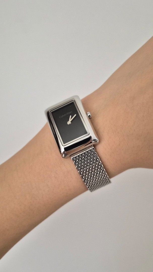 Calvin Klein Rectangular Mesh Watch (Category: Women's Watches) located in Quezon City. Submitted by mooneon (Listing ID 1434224327, Image 2). Description: - Calvin Klein watch - Rectangular black dial - Silver mesh strap - Minimalist design - Includes original box and tag - Calvin Klein logo on clasp -used once. like new cartier, calvin klein, minimalist watch, vintage watch design.