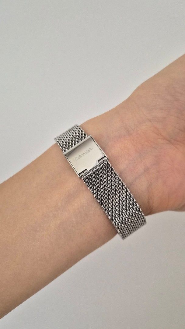 Calvin Klein Rectangular Mesh Watch (Category: Women's Watches) located in Quezon City. Submitted by mooneon (Listing ID 1434224327, Image 3). Description: - Calvin Klein watch - Rectangular black dial - Silver mesh strap - Minimalist design - Includes original box and tag - Calvin Klein logo on clasp -used once. like new cartier, calvin klein, minimalist watch, vintage watch design.