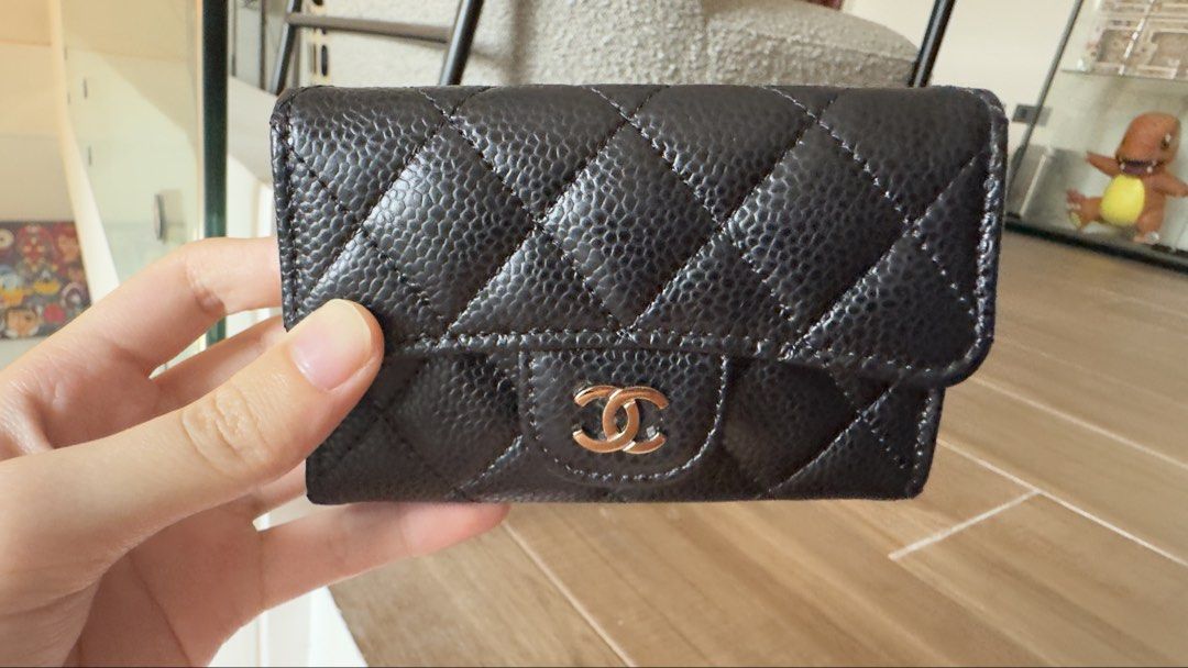 Chanel Card Holder (Category: Luxury Bags & Wallets) located in Plaridel. Submitted by kathtrene_alonzo39 (Listing ID 1433642288, Image 3). Description: -Unused - Authentic Chanel card holder - Classic black caviar design - Features the iconic CC logo - Includes original box - Comes with dust bag - Includes authenticity card - Chanel shopping bag included - Includes camellia flower.