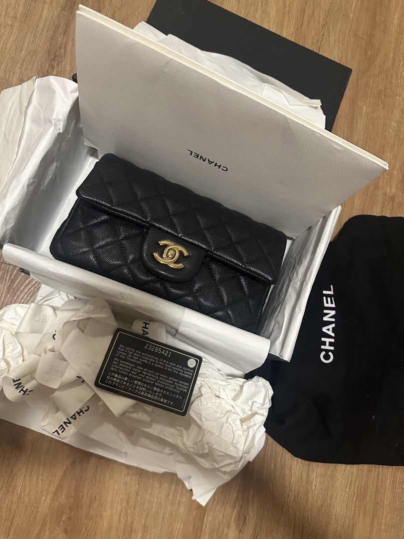 Chanel Mini Classic Flap Bag (Category: Luxury Bags & Wallets) located in Quezon City. Submitted by jennbustillos (Listing ID 1434350334, Image 1). Description: - Authentic Chanel MINI Classic Flap Bag - CAVIAR leather - Gold-tone CC turn-lock closure - Includes original box, dust bag, and authenticity card - Serial number: 23285421.