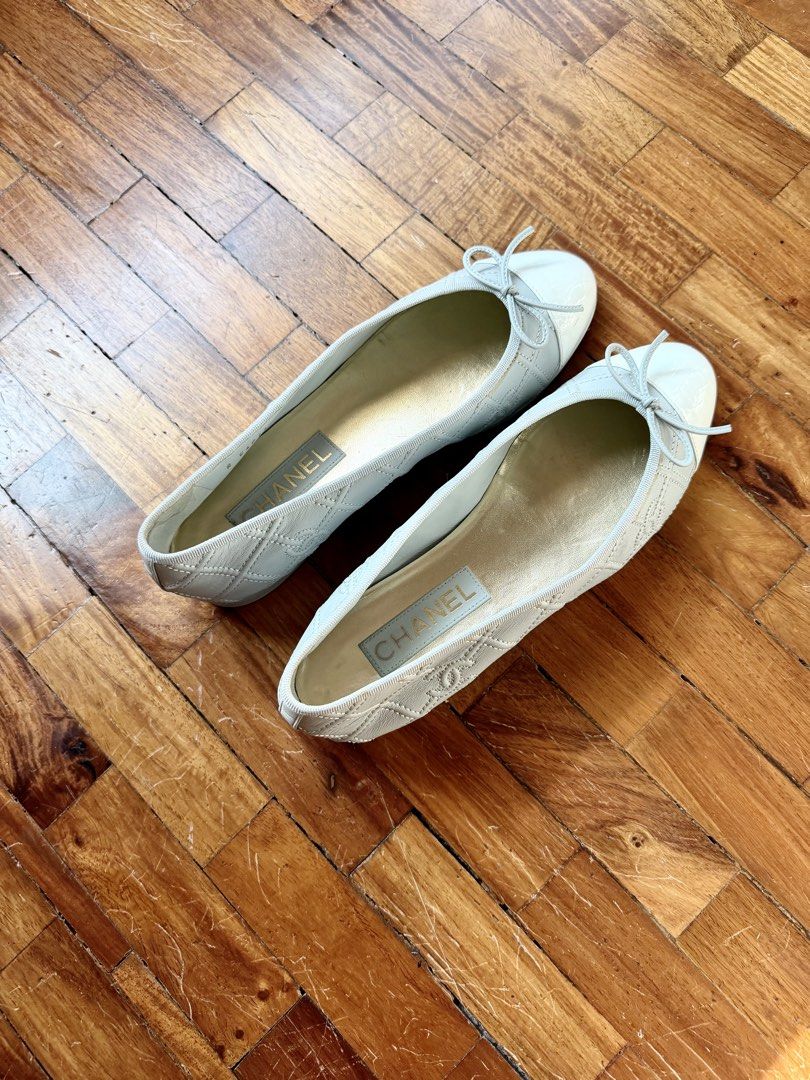 Chanel Quilted Ballet Flats Eu40 light gray (Category: Sneakers & Footwear) located in Mandaluyong City. Submitted by declutteringagain (Listing ID 1434255217, Image 2). Description: Chanel ballet flats, size 40. Light gray color, quilted stitched design, bow detail. Made in Italy. Authentic..