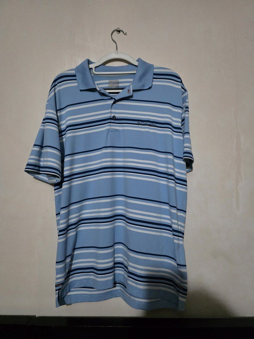 Columbia Striped Polo Shirt (Category: Tshirts & Polo Shirts ) located in San Fernando. Submitted by bizarrethrifting (Listing ID 1434199976, Image 2). Description: - Columbia polo shirt - Light blue with horizontal stripes - Collared neckline - Short sleeves - Columbia logo on chest - Button-up placket - Regular fit.