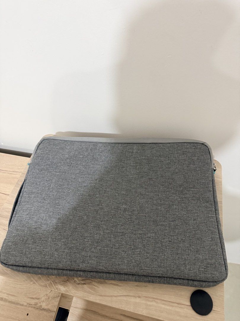 COTECT Laptop Bag (Category: Laptop Bags & Sleeves) located in Cebu City. Submitted by dr_marsh (Listing ID 1434213962, Image 3). Description: Never been used Bought at 1499 Protect your laptop in style with this gray COTECT Bag. Can fit macbook 13”. Features a secure zipper closure, front pocket, and soft interior lining. Sleek design for everyday use..