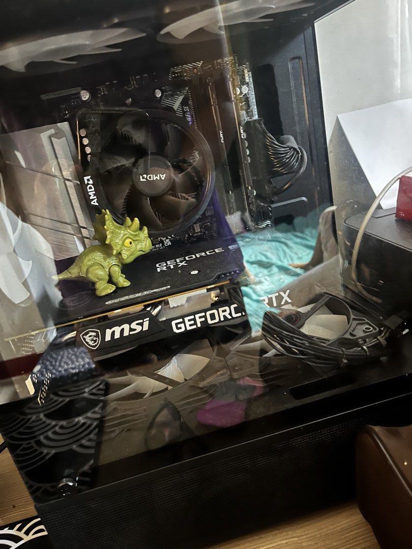 CPU Unit, Desktop - RTX 3060 12gb, Ryzen 5 5600 (Category: Desktops) located in Manila. Submitted by darktinola (Listing ID 1434263298, Image 2). Description: Ryzen 5 5600 MSI RTX 3060 12gb Asrock B550 wifi 16gb Ram 500gb nvme m.2 storage MSI Mag 650w power supply Coolman Reyna case Lahat ng parts bought bnew in January 2026 w reciept sa JDM technohub Slightly nego RFS: switching back to laptop for office work For pick up Batangas City.