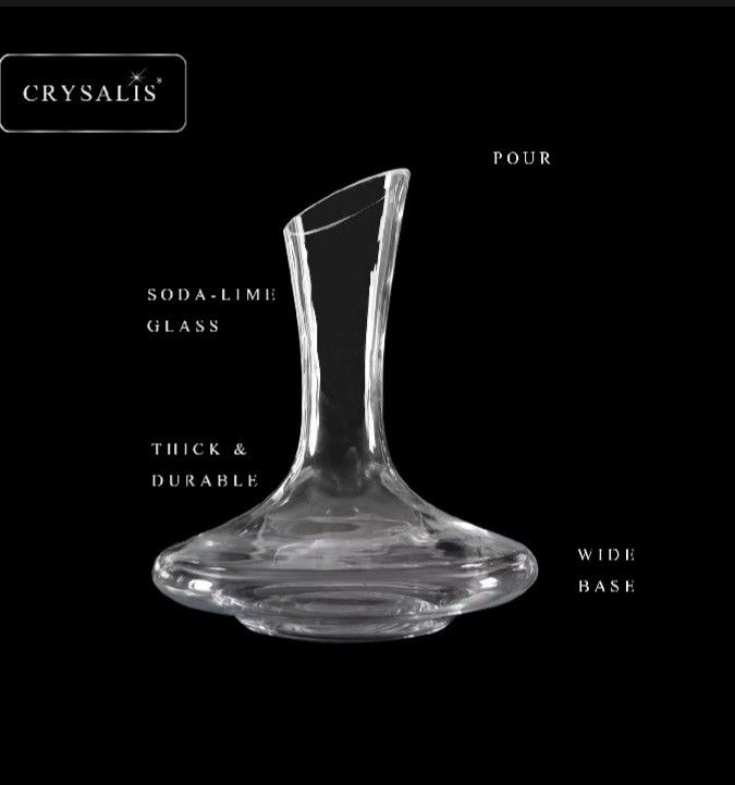 Crysalis Wine Decanter (Category: Other Kitchenware & Tableware) located in Cavite. Submitted by geturs (Listing ID 1434263908, Image 2). Description: - Crystalis wine decanter - Made of soda-lime glass - Features a wide base and pour spout - Designed to aerate wine for enhanced flavor and aroma - Comes in its original box - Ideal for home use or as a gift.