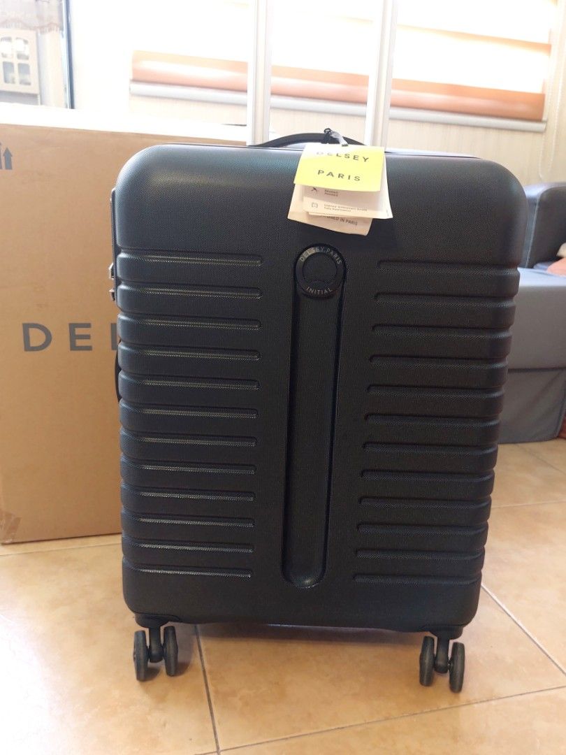 Delsey Paris Cabin Luggage (Category: Luggage) located in Manila. Submitted by happy_travellerph (Listing ID 1434246957, Image 1). Description: Delsey Paris Iroisie Black/Noir - Carry-on size 55cm - Secure combination lock - Retractable handle for easy maneuvering - Interior with patterned lining - Comes with original brand tag, box -Bought from S&R -Brand New/Unused.