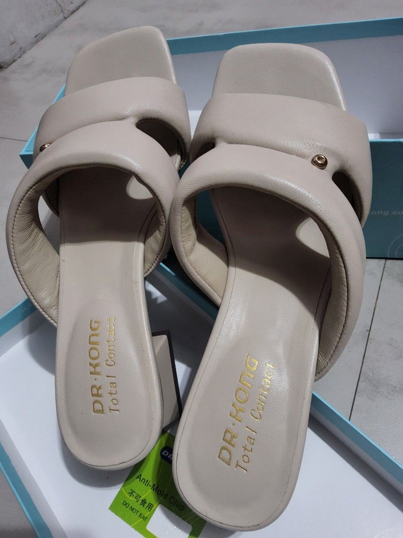 Dr. Kong Beige Sandals (Category: Flats & Sandals) located in Taytay. Submitted by chi.locker (Listing ID 1434226822, Image 2). Description: - Beige Dr. Kong sandals - Square toe design - Block heel, 1-2 inches - Comes with original box - Insole features "Dr. Kong Total Contact" marking - Slightly used, about 5x -Rfs: feels small, snug as strap is cushioned. better if feet are narrow. .