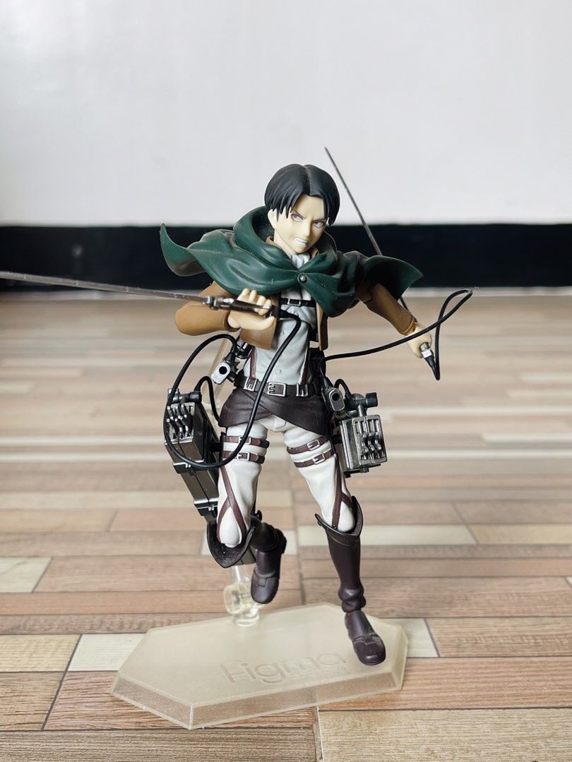 Figma 213 Levi Attack on Titan Action Figure (Category: Figurines & Statues) located in Manila. Submitted by donquixote_daiki (Listing ID 1434347645, Image 1). Description: - Figma 213 Levi action figure - From Attack on Titan - Includes multiple face plates - Comes with swords and 3D maneuver gear - Features a stand for dynamic posing - Highly detailed and articulated figure.