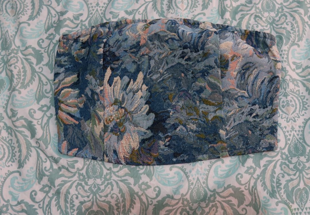 Floral Corset Tube Top (Category: Sleeveless) located in Manila. Submitted by lovedbydar (Listing ID 1434261649, Image 1). Description: - Floral corset top - Colors: Blue, green, and peach - Back zipper closure - Interior lining with floral pattern - Perfect for vintage-inspired looks.