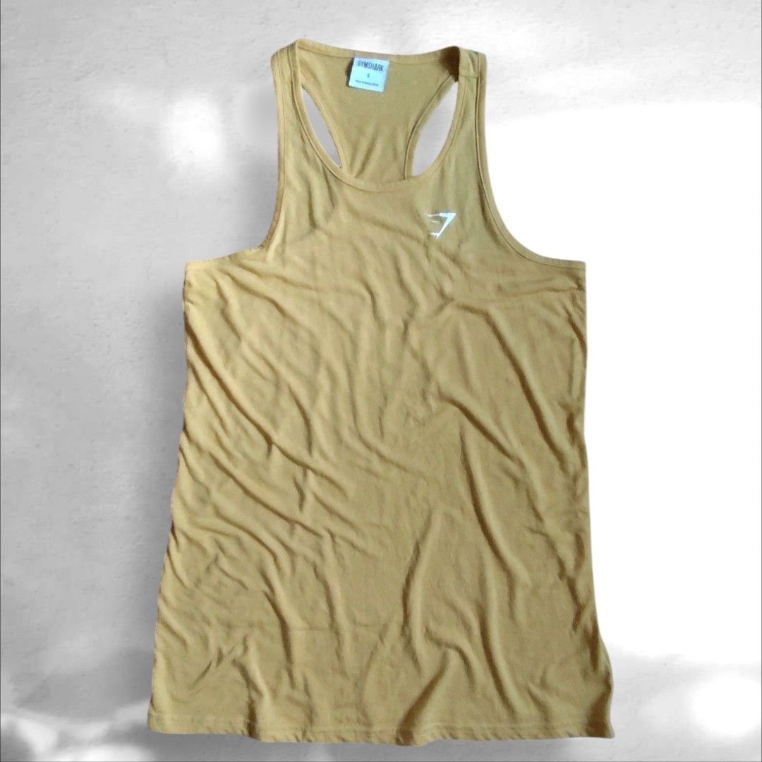 GYMSHARK SANDO (Category: Activewear) located in Marikina City. Submitted by kingdrel (Listing ID 1434197957, Image 1). Description: GYMSHARK Women's Sleeveless Boxer Training T-shirt Oversize size S W 17.5 L 29 VERYGOOD CONDITION NO ISSUE COLORATE 9.5.