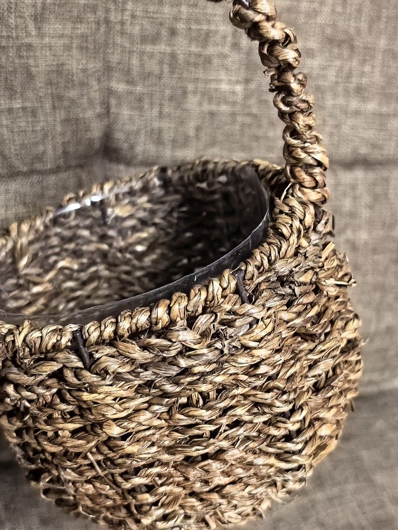 Handwoven Basket with Handle (Category: Storage Boxes & Baskets) located in Rizal. Submitted by gkstcenit (Listing ID 1434301985, Image 3). Description: - Handwoven basket - Sturdy handle - Natural earthy tone - Includes plastic lining - Perfect for plants, storage, or decoration - Durable and well-crafted.
