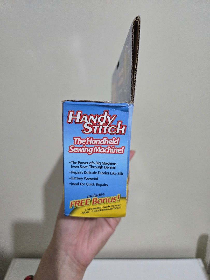 Handy Stitch Handheld Sewing Machine - Complete Set (Category: Craft Supplies & Tools) located in Manila. Submitted by antonettelim (Listing ID 1434312956, Image 2). Description: Perfect for quick repairs, hems, or small DIY crafts. This is the original handheld sewing machine that’s easy to store and use on the go. ​Condition: Excellent, all original parts included. ​Note: Requires 4 "AA" batteries (not included). ​Great for: Students, travelers