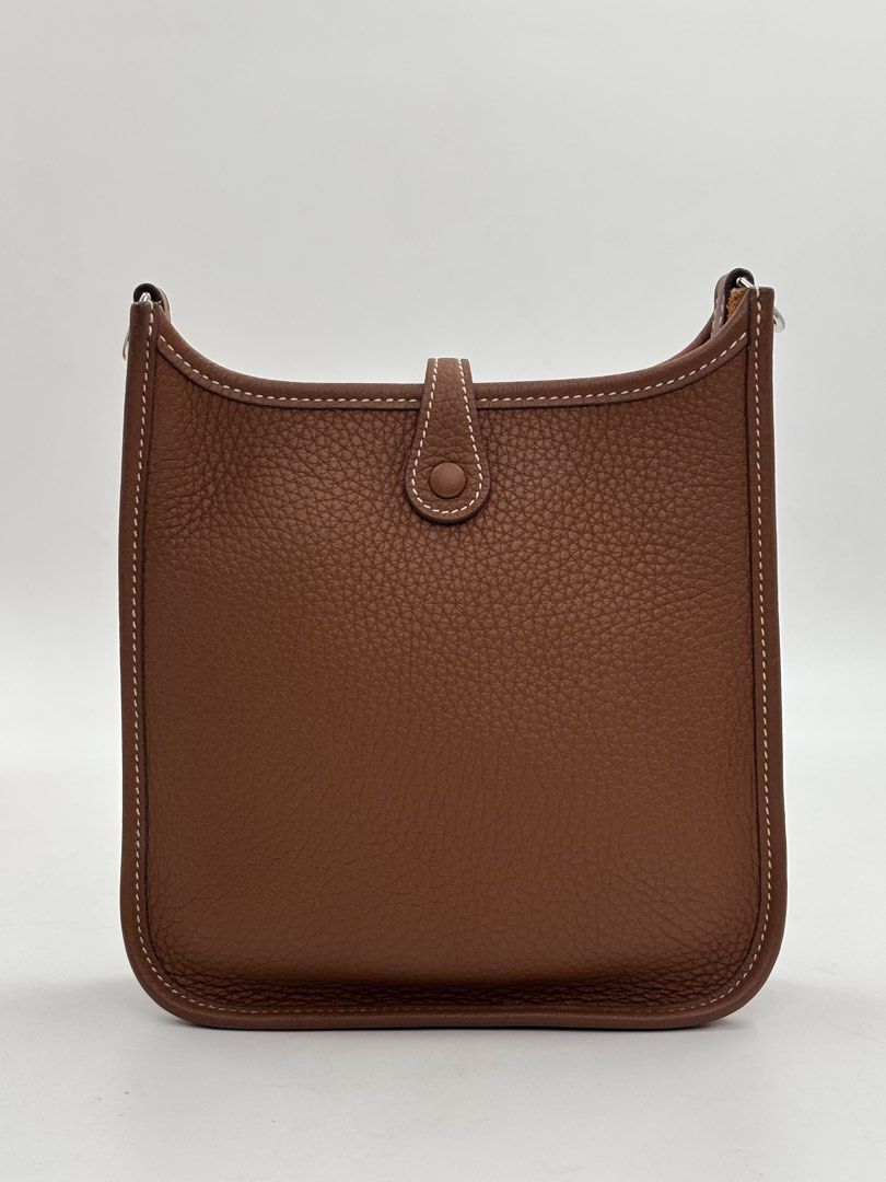 Hermes Evelyne TPM Gold (Category: Luxury Bags & Wallets) located in Manila. Submitted by patrickmaningas (Listing ID 1434330877, Image 3). Description: - Authentic Hermes Evelyne TPM - Crafted from rich brown leather - Features the signature perforated 'H' logo - Comfortable canvas shoulder strap - Secure snap closure - Palladium hardware - With Paperbag, Dustbag and Legit Grails.