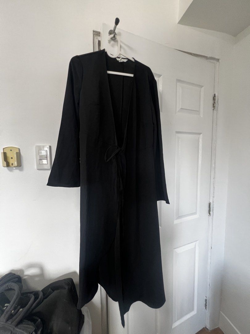 H&M Black Long Dress / Robe (Category: Dresses) located in Manila. Submitted by binigurrl (Listing ID 1434204598, Image 1). Description: - H&M black long dress - Size: S - Features a tie closure at the waist - Long sleeves - Versatile for layering or wearing alone - A wardrobe essential.