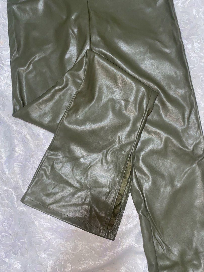 H&M Divided Faux Leather Flared Pants (Category: Jeans) located in Padre Garcia. Submitted by ac.clvr (Listing ID 1434372248, Image 2). Description: - Bought for arnd 2k - Worn twice - H&M Divided faux leather pants - Color: Army green - Size: XS - Style: Flared leg with side slit - Features: High waist, almost v-shaped - Perfect for an edgy, stylish look.