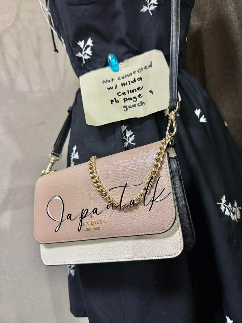 Kate Spade New York Chain Bag (Category: Luxury Bags & Wallets) located in Bulacan. Submitted by vintage_purge (Listing ID 1434178798, Image 3). Description: - Kate Spade New York bag - Color: Beige and white - Features: - Chain strap - Flap closure - Magnetic closure - Includes: - Black strap - Interior pocket.