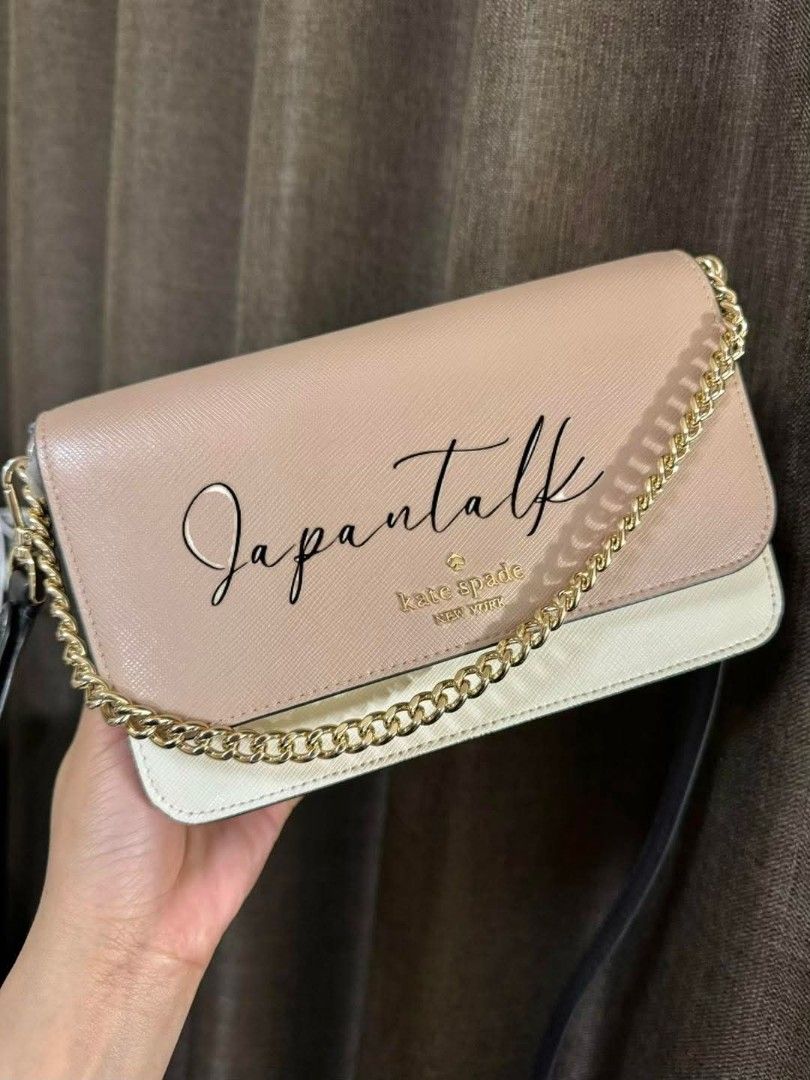 Kate Spade New York Chain Bag (Category: Luxury Bags & Wallets) located in Bulacan. Submitted by vintage_purge (Listing ID 1434178798, Image 2). Description: - Kate Spade New York bag - Color: Beige and white - Features: - Chain strap - Flap closure - Magnetic closure - Includes: - Black strap - Interior pocket.
