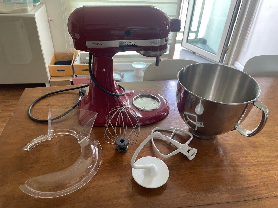 KitchenAid Artisan Stand Mixer 5QT (Category: Hand & Stand Mixers) located in Pasig City. Submitted by jakejake.150be9 (Listing ID 1434321075, Image 1). Description: - KitchenAid Artisan stand mixer in red - Includes stainless steel mixing bowl - Comes with dough hook, wire whip, flat beater, and pouring shield - Tilt-head design for easy access - Perfect for baking and cooking - All attachments included - barely used, mostly in storage - 220V.