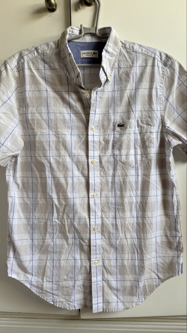 Lacoste Regular Fit Plaid Shirt (Category: Tshirts & Polo Shirts ) located in Valenzuela. Submitted by dees.corner (Listing ID 1434193230, Image 1). Description: -Brandnew - Lacoste Regular Fit short-sleeved shirt - Plaid pattern in beige and blue - Features a chest pocket with the Lacoste logo - Button-down closure and collar - Size: M (FR 40) -W18 L29.
