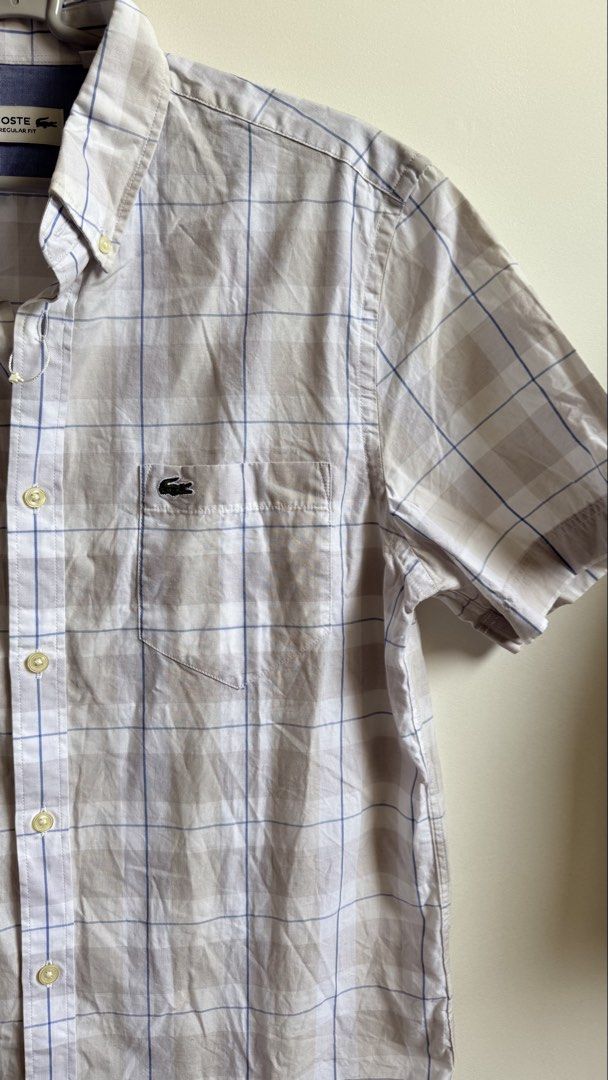 Lacoste Regular Fit Plaid Shirt (Category: Tshirts & Polo Shirts ) located in Valenzuela. Submitted by dees.corner (Listing ID 1434193230, Image 2). Description: -Brandnew - Lacoste Regular Fit short-sleeved shirt - Plaid pattern in beige and blue - Features a chest pocket with the Lacoste logo - Button-down closure and collar - Size: M (FR 40) -W18 L29.