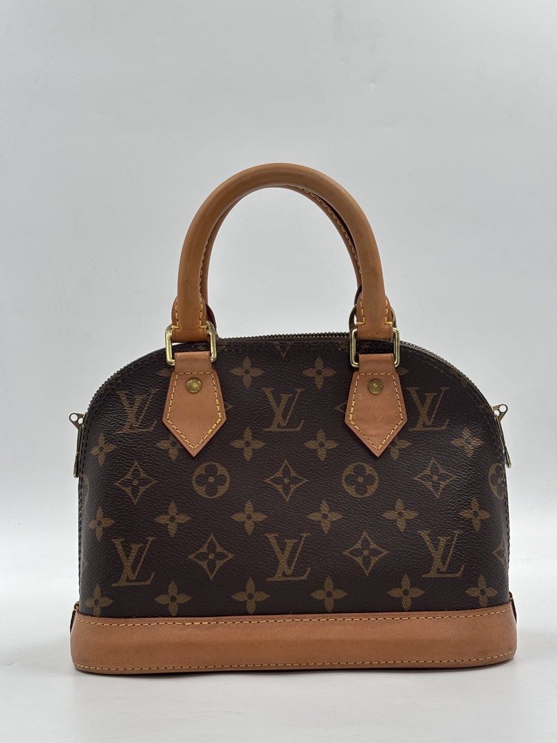 Louis Vuitton Alma BB Monogram Handbag (Category: Luxury Bags & Wallets) located in Manila. Submitted by patrickmaningas (Listing ID 1434334249, Image 2). Description: - Authentic Louis Vuitton Alma BB handbag - Monogram canvas - Top handle and detachable shoulder strap - Zip closure - Gold hardware - Includes dust bag, box, care card and Entrupy.