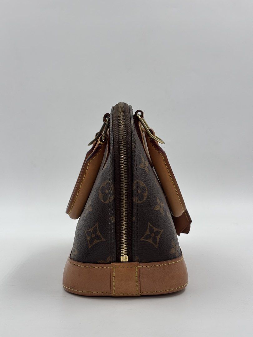 Louis Vuitton Alma BB Monogram Handbag (Category: Luxury Bags & Wallets) located in Manila. Submitted by patrickmaningas (Listing ID 1434334249, Image 3). Description: - Authentic Louis Vuitton Alma BB handbag - Monogram canvas - Top handle and detachable shoulder strap - Zip closure - Gold hardware - Includes dust bag, box, care card and Entrupy.