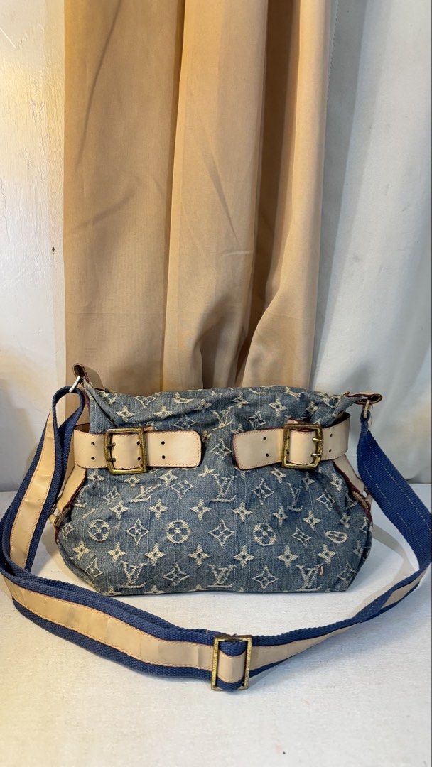Louis Vuitton Denim Shoulder Bag (Category: Luxury Bags & Wallets) located in Manila. Submitted by ynilleryzc (Listing ID 1434338711, Image 1). Description: - Authentic Louis Vuitton shoulder bag - Denim exterior with LV monogram - Beige leather strap with blue accents - Gold-tone hardware - Includes two additional beige leather straps - Stylish blend of denim and leather.