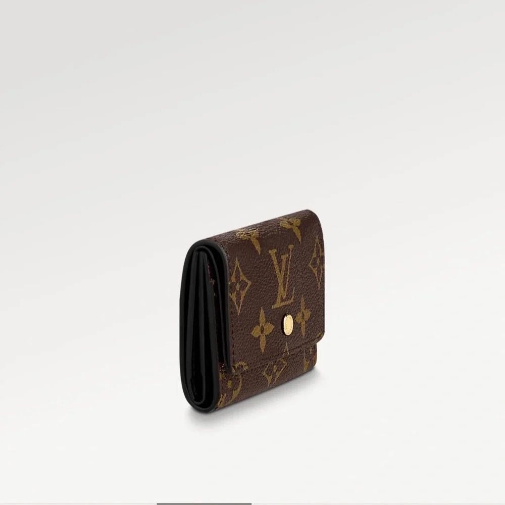 Louis Vuitton Monogram Micro Wallet (Category: Luxury Bags & Wallets) located in Cavite. Submitted by mel.vee22 (Listing ID 1434356064, Image 2). Description: Louis Vuitton Monogram Micro Wallet – Very Good Condition ✨ Selling my authentic Louis Vuitton Monogram Micro Wallet in very good pre-loved condition. Compact yet very functional and well cared for. Price: ₱15,000 Details: • 4 card slots • Bill compartment • Snap closure • Classic LV Monogr