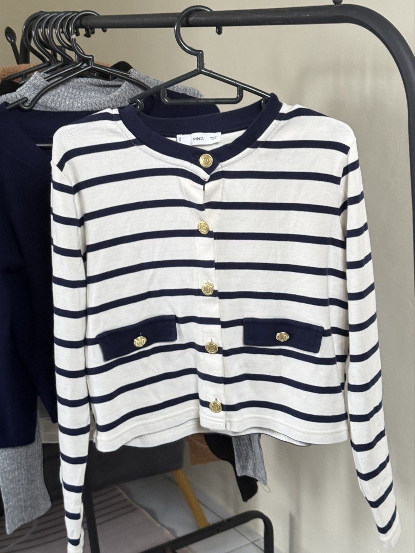 Mango Striped Cardigan with Gold Buttons (Category: Sleeveless) located in Baguio. Submitted by allysltc (Listing ID 1434246207, Image 1). Description: - Used for an event lang - Knitted fabric - Bought for 1,990 - Navy and cream color scheme - Size M - Round neckline - Gold button details.