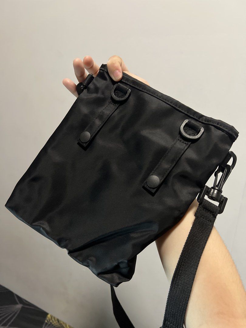 MUJI Black Crossbody Bag (Category: Cross-body Bags) located in Pasig City. Submitted by amxene (Listing ID 1434330186, Image 2). Description: - MUJI black crossbody bag - Adjustable shoulder strap - Multiple compartments - Simple, minimalist design - Durable and likely water-resistant material - Interior tag with product information - Ideal for everyday use - orig price 700+.