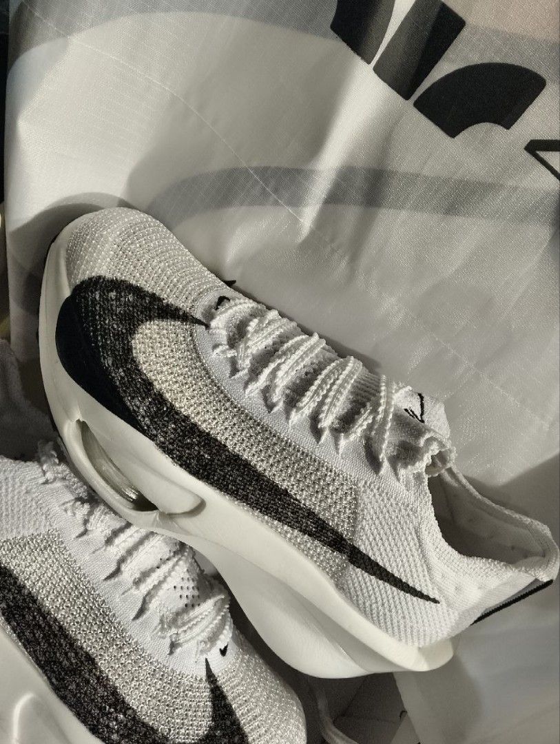 NIKE AIR ZOOM ALPHAFLY NEXT% BLACK & WHITE (Category: Sneakers) located in Naga. Submitted by drifted_clozette (Listing ID 1434128854, Image 1). Description: NIKE AIR ZOOM ALPHAFLY NEXT% *EYE -CATCHING WHITE/BLACK & BLACK SWOOSH COLOR WAY *FEATURING THE ICONIC NIKE SWOOSH LOGO *COMFORTABLE SOCK-LIKE UPPER *FLYPLATE AND ZOOMX SOLE MARKING Condition: BRAND NEW AVAILABLE SIZE (EUR: 37.5, US:6.5) (EUR: 38, US:7) (EUR:39, US:8) (EUR:40, US: 7) (EUR:41