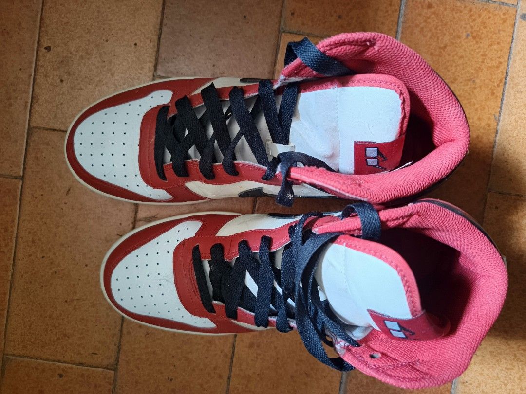 Nike High-Top Sneakers Red White Black (Category: Sneakers) located in Quezon City. Submitted by SM0SHY (Listing ID 1434192326, Image 3). Description: - Classic Nike high-top sneakers - Color scheme: Red, white, and black - Features the iconic Nike swoosh - Bold "NIKE" branding on the heel - Black laces - White midsole - Design includes red and white panels with black ankle accent -Size US 10 | UK 9 |EUR 44 |CM 28.